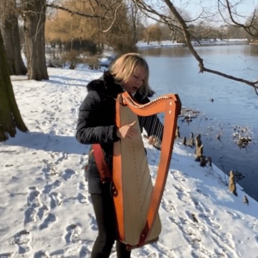 Marie Nicot with her Odyssey harp