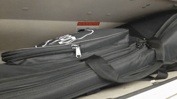 Odyssey harp in the overhead locker